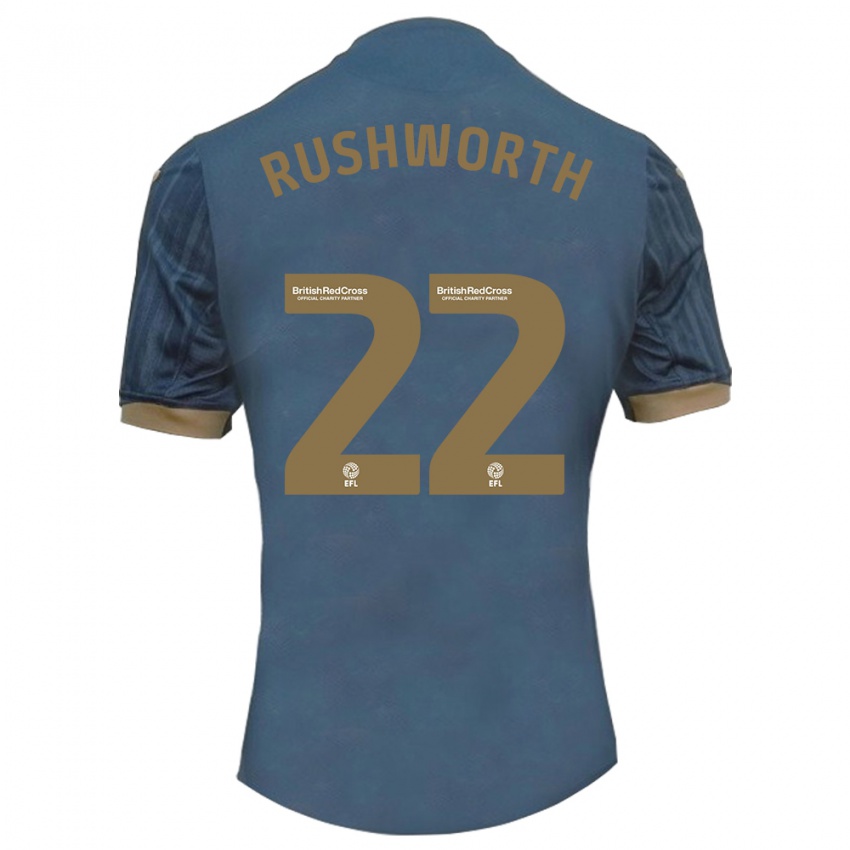 Criança Camisola Carl Rushworth #22 Azul-Petróleo Escuro Alternativa 2023/24 Camisa